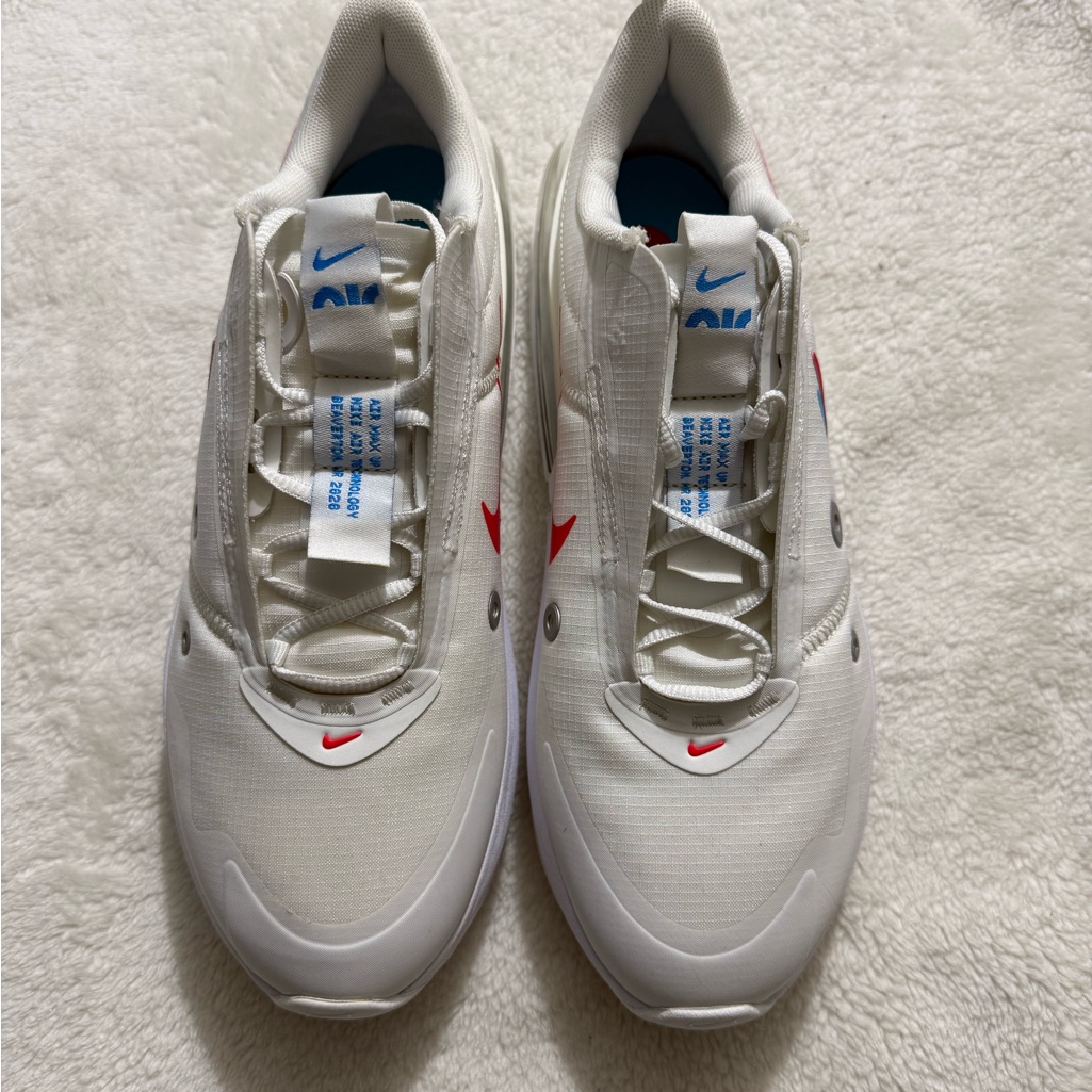 Nike White Athletic Sneakers With Red And Blue Accents